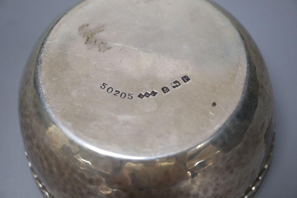 A George V Arts & Crafts Liberty & Co silver bowl with Celtic style border, Birmingham, 1930, diameter 10.5cm, 141 grams,